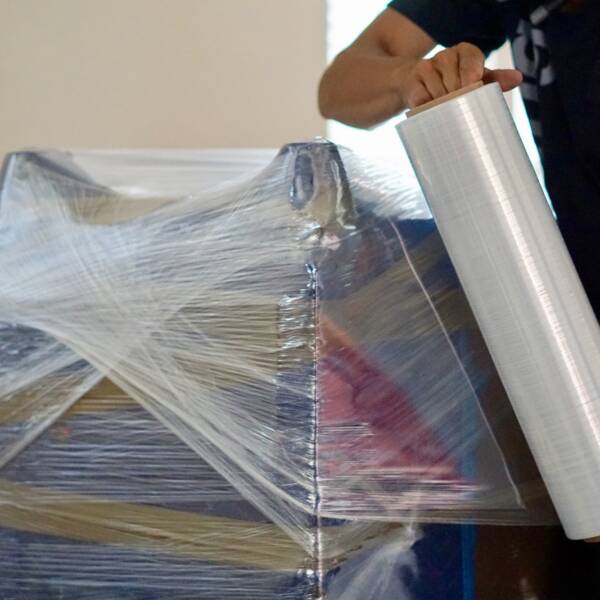 furniture-being-wrapped-in-plastic-before-moving